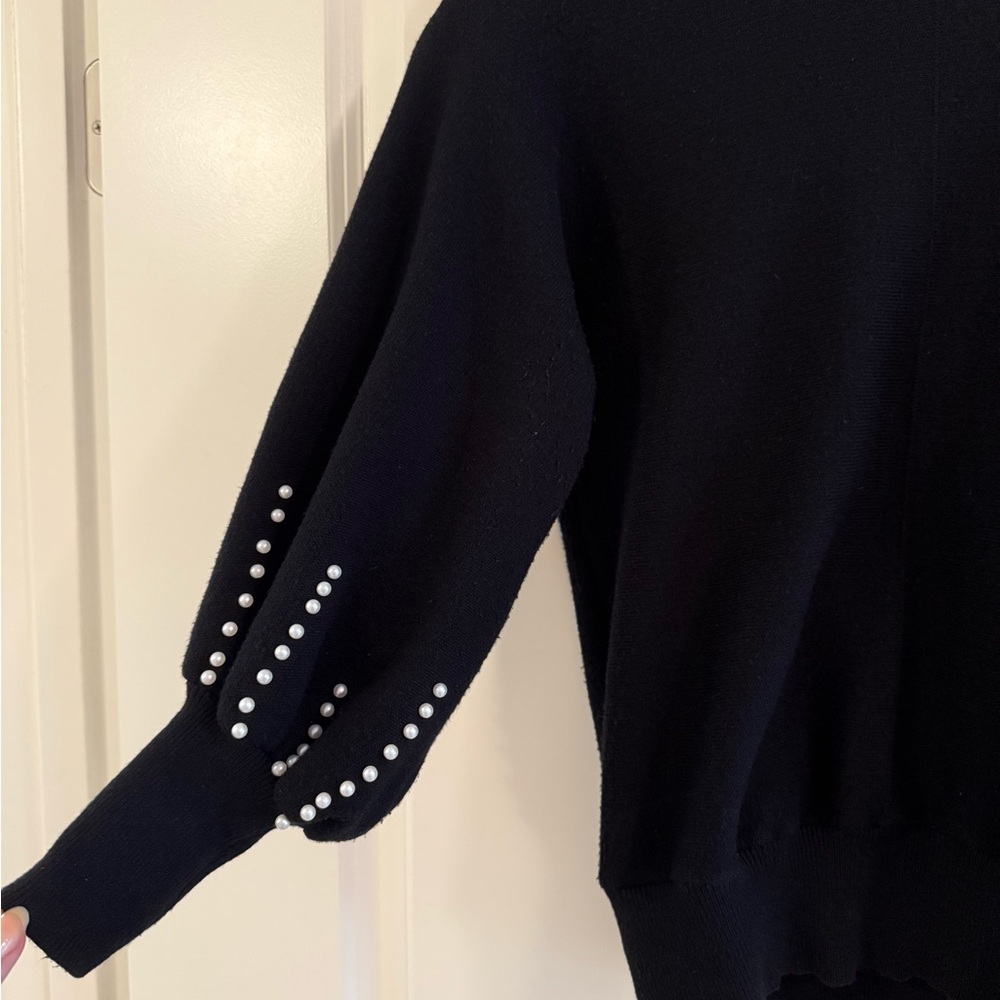 Elegant Black Sweater with Pearl Detailing